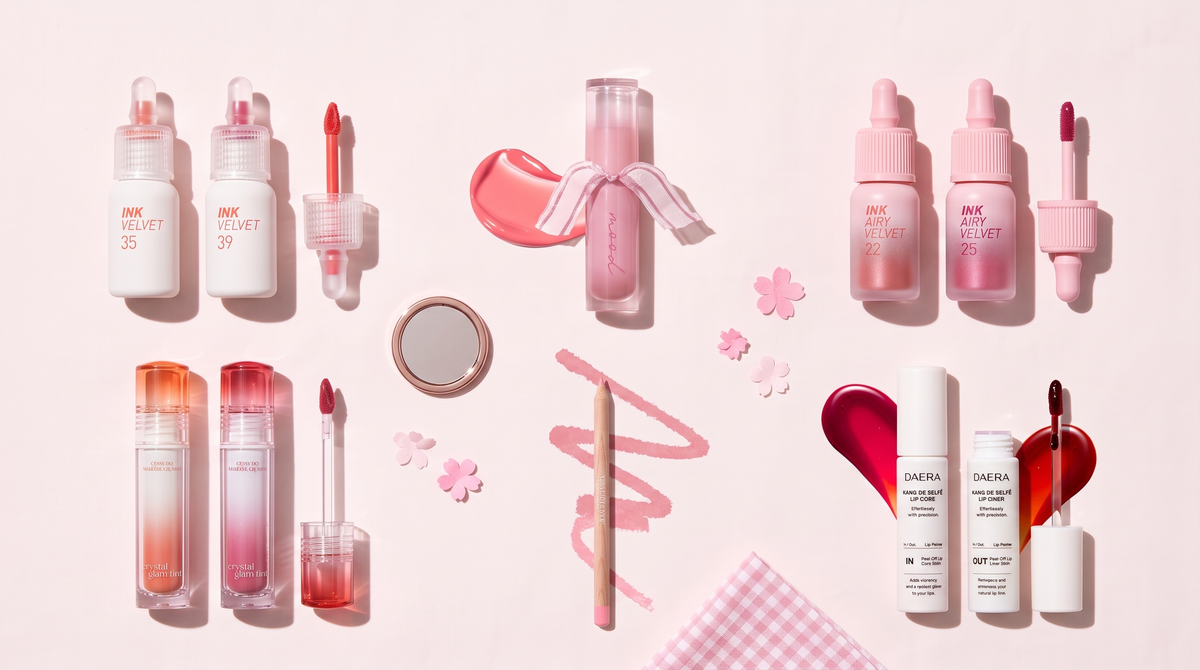Peripera and CLIO lip tints and pencil, with DAERA Kang De Selfe Lip Liner and Lip Core on a pink backdrop