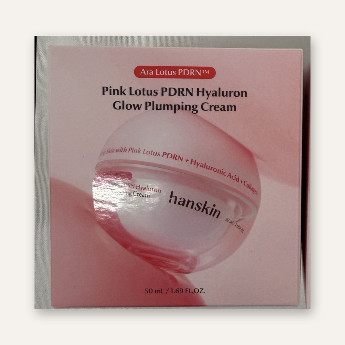 Hanskin Pink Lotus PDRN Hyaluron Glow Plumping Cream 1.69 fl oz (50 ml) — boxed pink cream jar