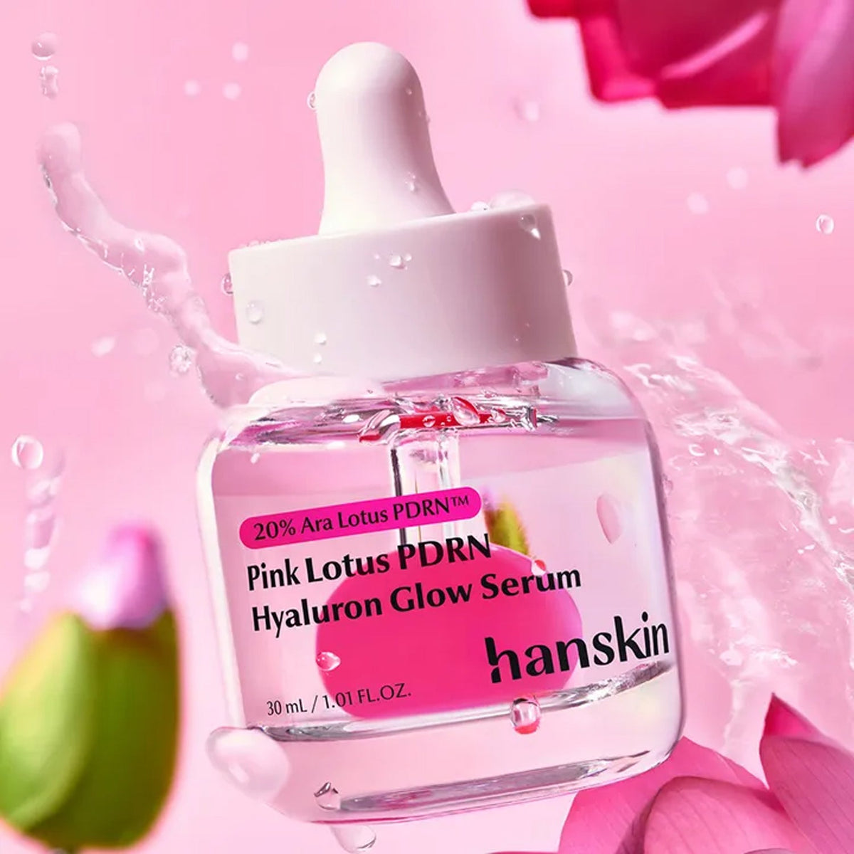 Hanskin Pink Lotus PDRN Hyaluron Glow Serum 1.01 fl oz (30 ml) — close-up of the pink serum bottle label