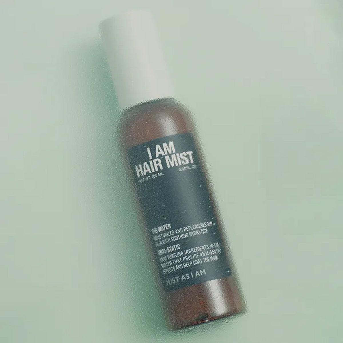 JUST AS I AM I Am Hair Mist, Fig Water 3.38 fl oz (100 ml) — hair mist bottle photographed with green leaves