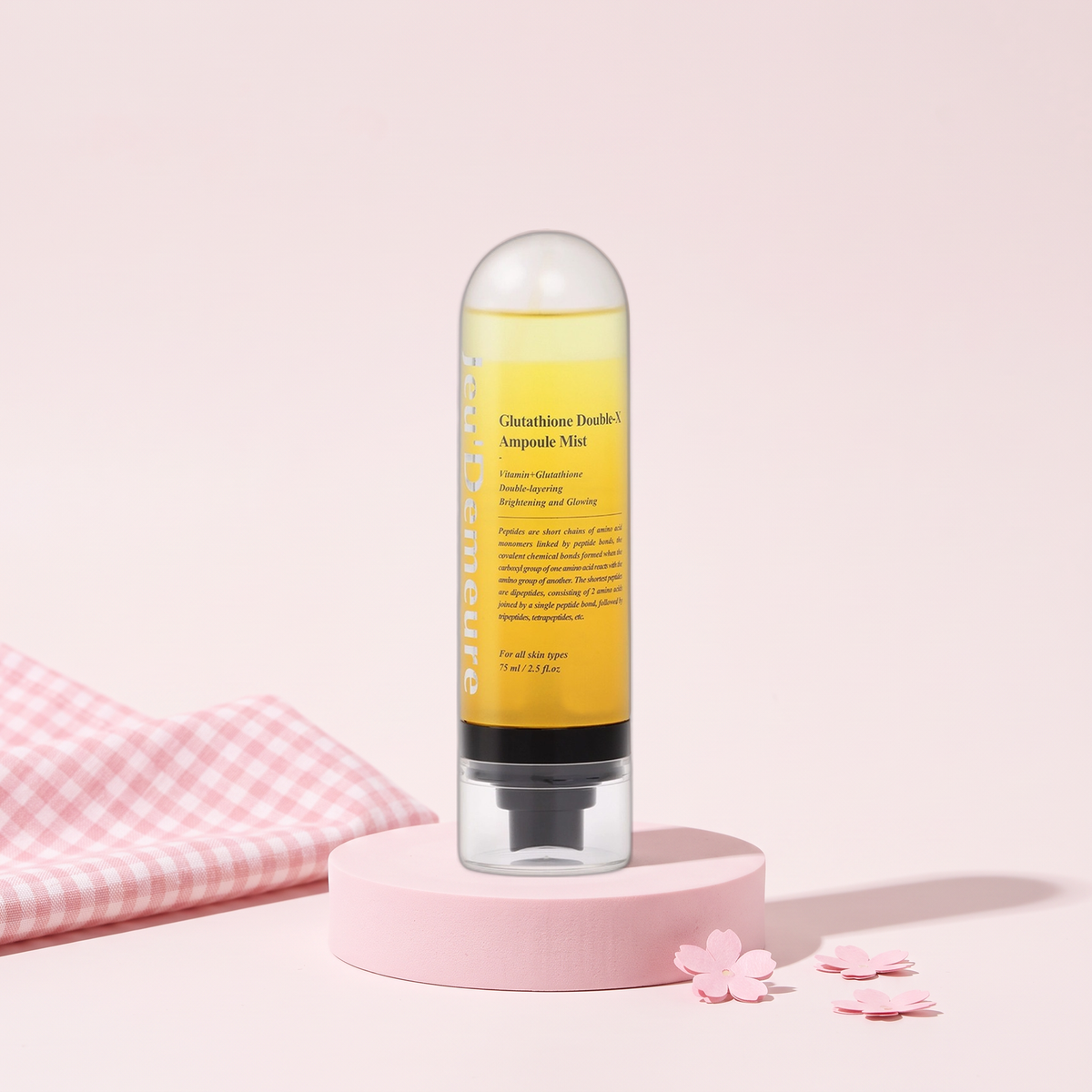 Jeu'Demeure Glutathione Double-X Ampoule Mist 2.53 fl oz (75 ml) on a pink plinth