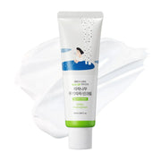 Round Lab Birch Juice Mild Up mineral sunscreen tube with cream swatch