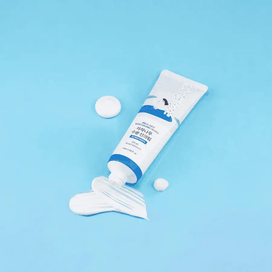 Birch Juice Moisturizing Sunscreen tube with a dot of cream