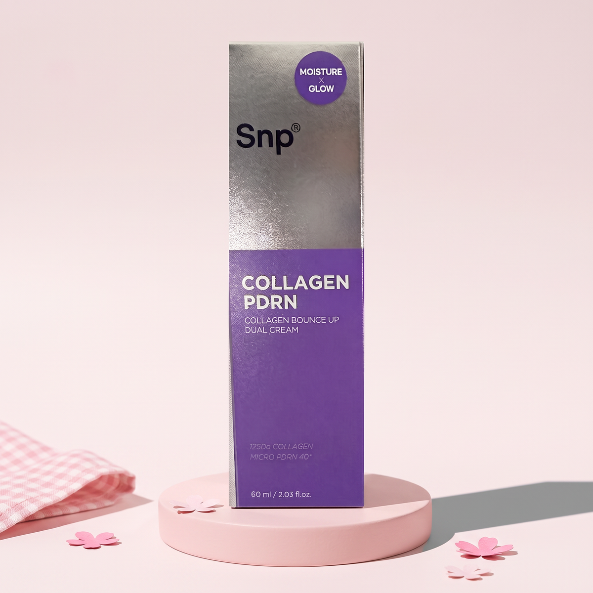 SNP Collagen Bounce Up Dual Cream 2.03 fl oz (60 ml) on a pink plinth