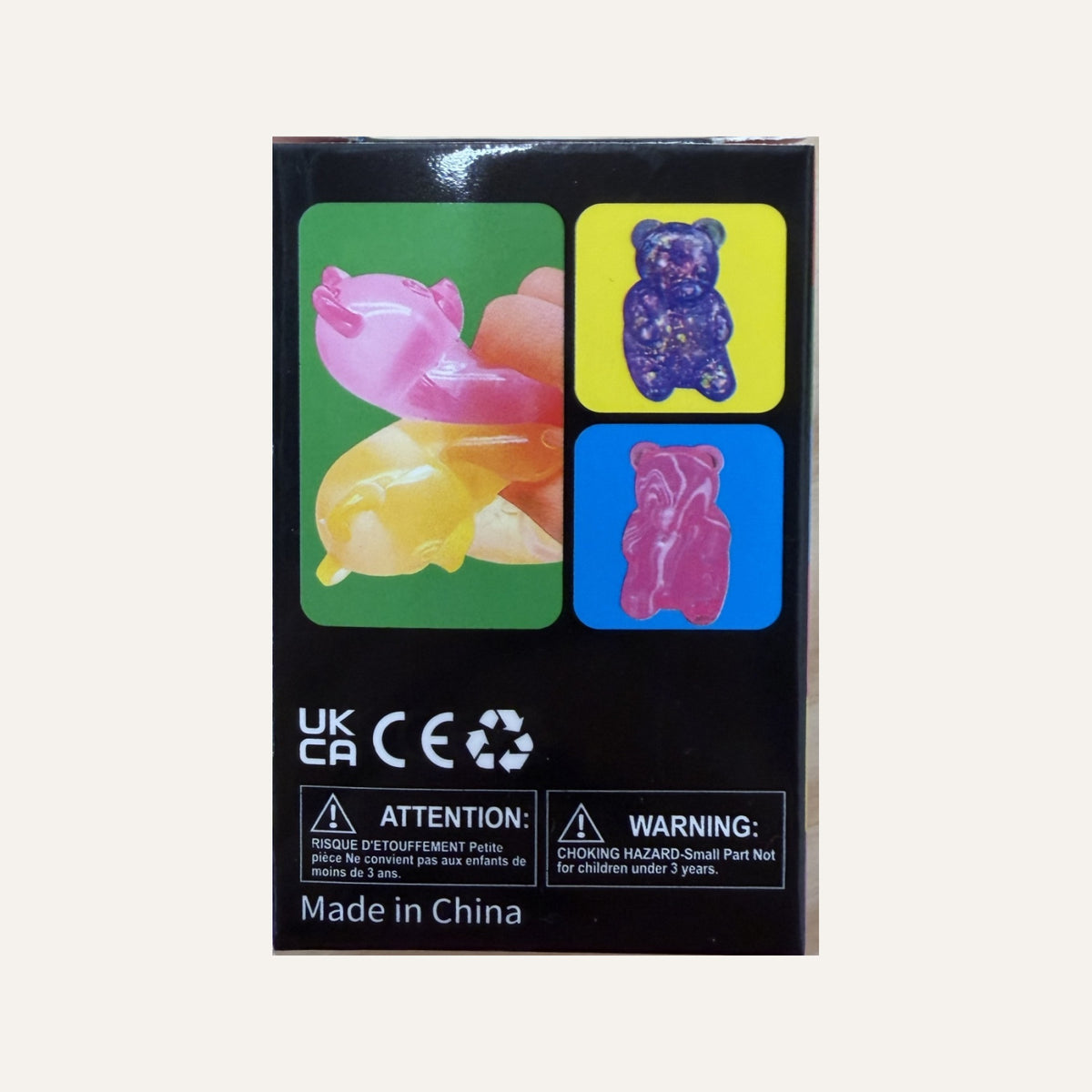 Gummy Bear Squish box back, color variations and warning