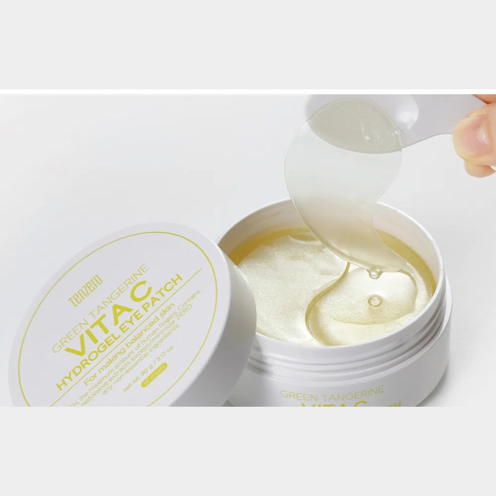 tenzero Green Tangerine Vita C Hydrogel Eye Patch open jar with spatula