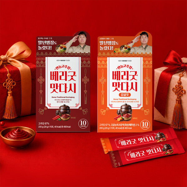 Very Good Food Matdasi Gochujang Sauce Sticks, Original and Tangerine boxes with sticks