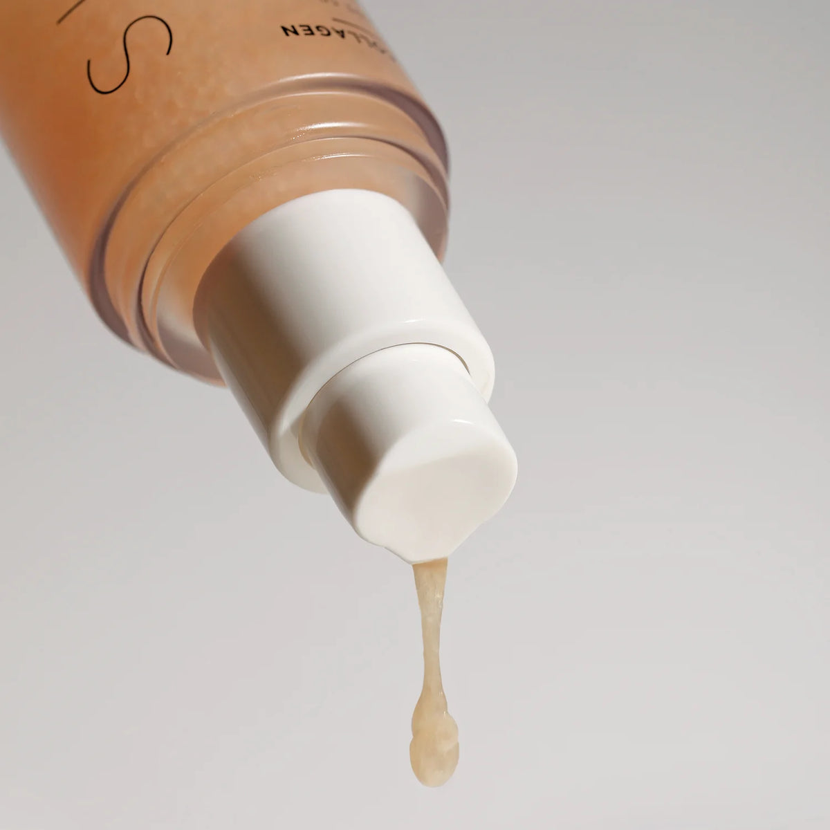 Collagen Sun Serum beige fluid dispensing from the pump
