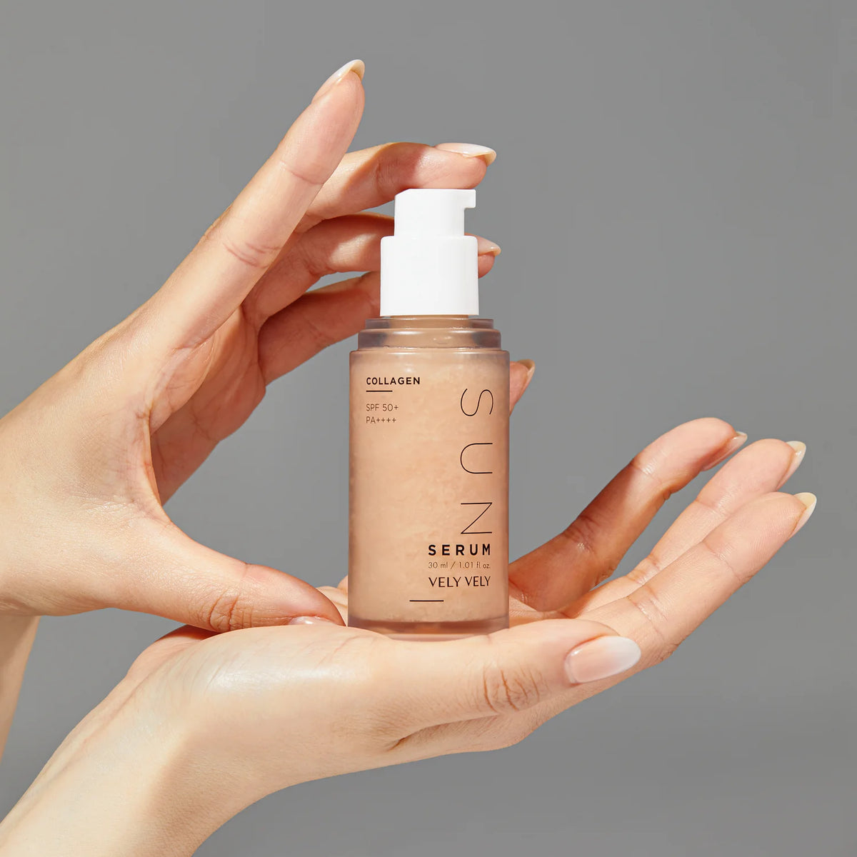 Collagen Sun Serum held in two hands