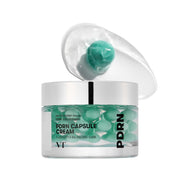 VT Cosmetics PDRN Capsule Cream 100 1.69 fl oz (50 ml) — green cream jar and spatula